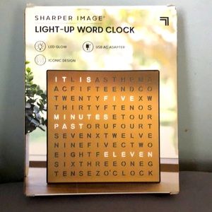 Sharper image light up word clock.